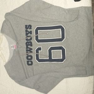 Pink vs cowboys sweater